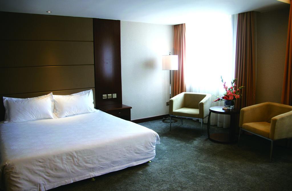New Gloria Plaza Garden Hotel Harbin Bagian luar foto