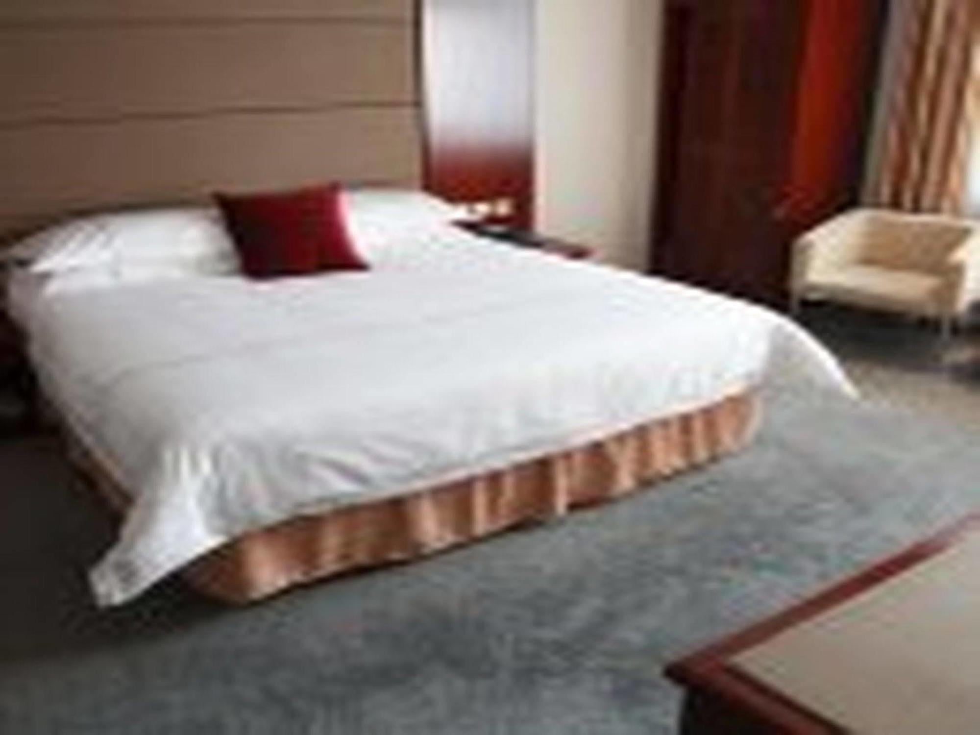 New Gloria Plaza Garden Hotel Harbin Bagian luar foto